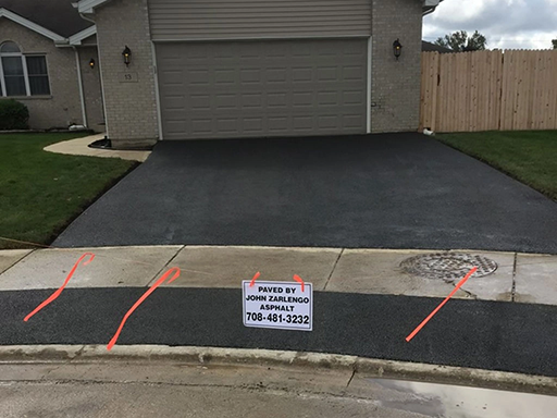 Residential driveway asphalt paving in Steger, Illinois by John Zarlengo Asphalt Paving