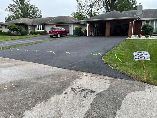 Residential driveway asphalt paving in Homewood, Illinois by John Zarlengo Asphalt Paving